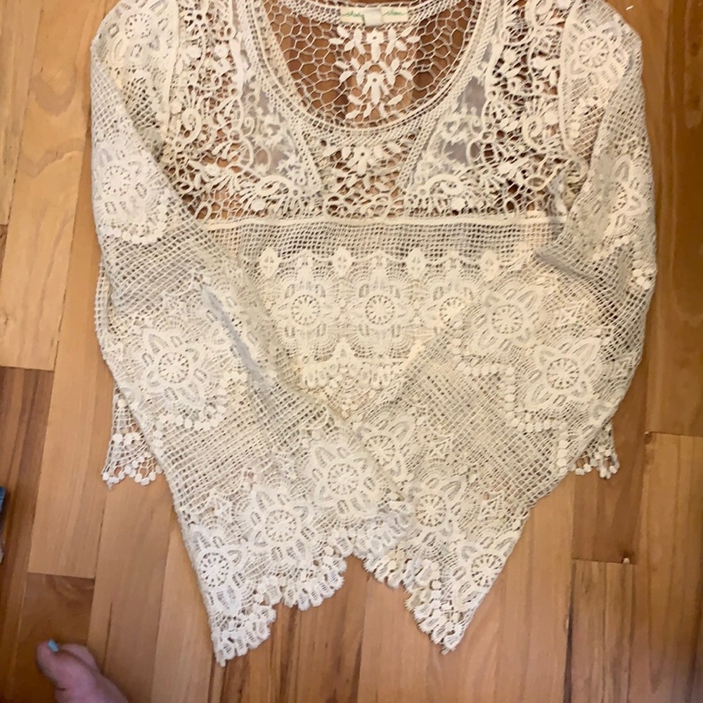 Bell-sleeve crochet blouse